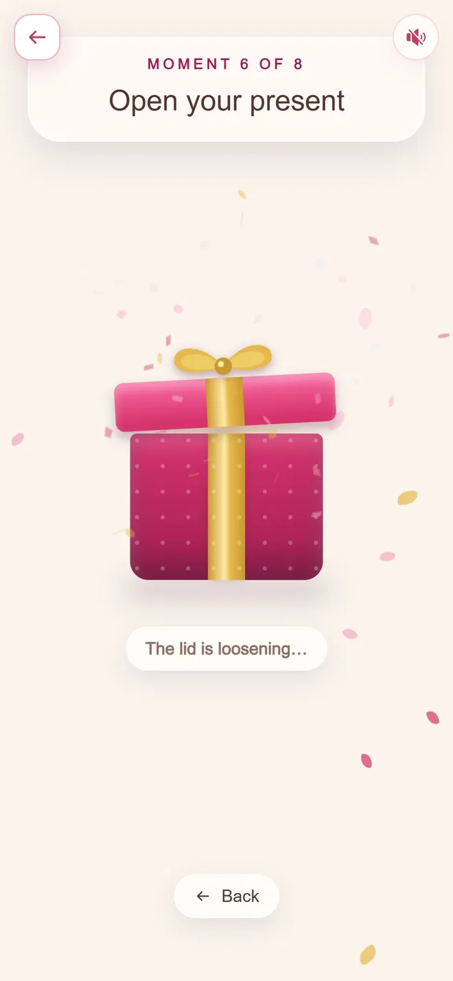 The open your present moment, a wrapped gift wiggling as its lid loosens